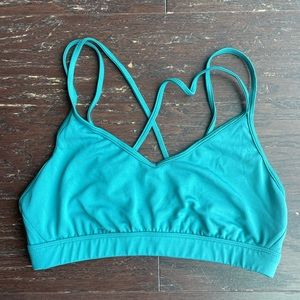 Bright teal cross cross back sports bra from Old Navy. Great for low impact!